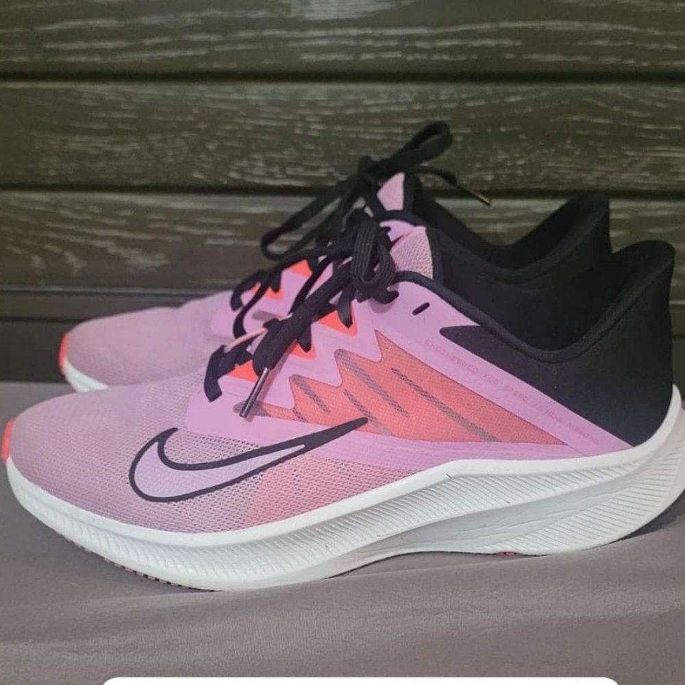 Pink and Black Nike Quest 3